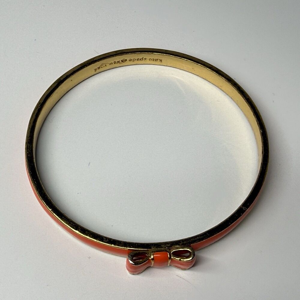 Kate Spade New York Skinny Gold And Orange Enamel Bangle Bow Bracelet - Picture 7 of 8